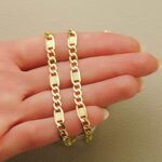 Cadena Cartier Hueca de Oro Amarillo 18K con 50 cm de Largo y 5 mm de Grosor - Imagen 2